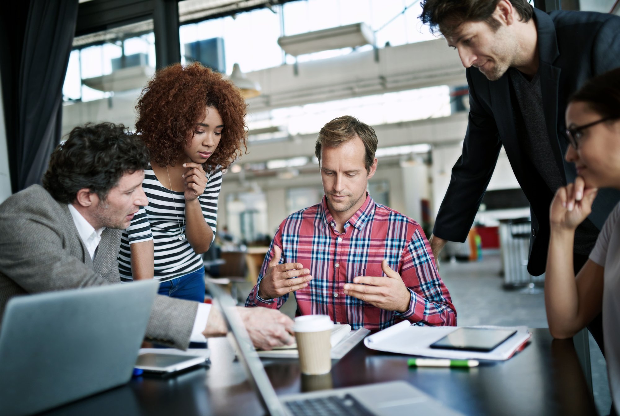 designing-minds-shot-of-office-workers-talking-in-2023-11-27-05-05-58-utc (1)