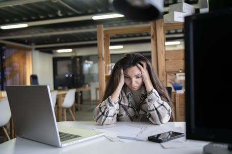 exhausted-young-woman-feeling-overwhelmed-at-her-o-2025-01-26-23-42-03-utc
